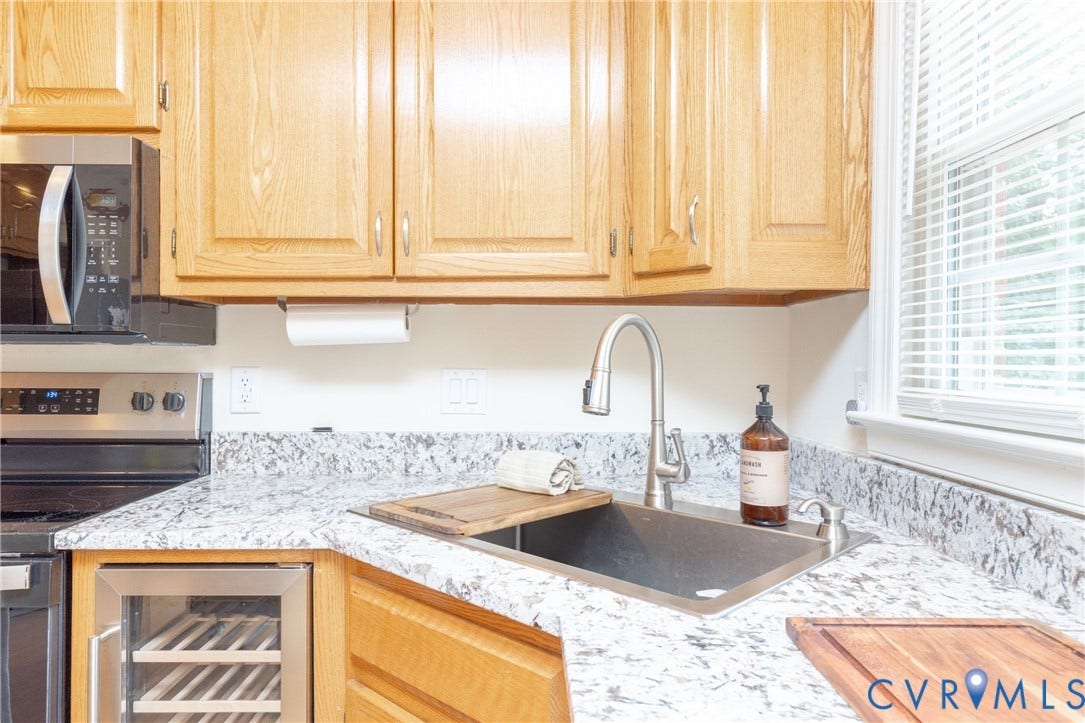 4104 Birchleaf Court, Chester, VA 23831 granite countertops, wine fridge, built in microwave, flat top cooking
