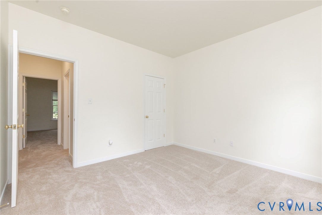 13742 Spyglass Hill Circle, Chesterfield, VA 23832 Neutral interior featuring wall-to-wall carpeting and a six-panel interior door