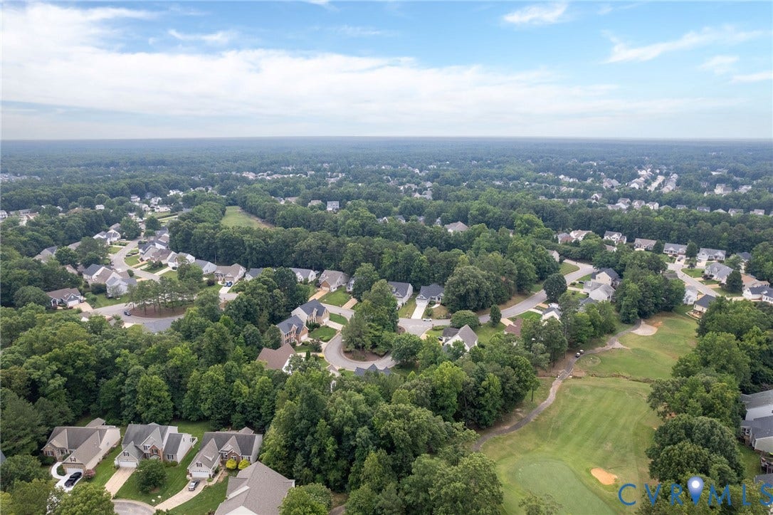 13742 Spyglass Hill Circle, Chesterfield, VA 23832 Aerial perspective featuring suburban residential streets, mature tree canopy, and proximity to a golf course