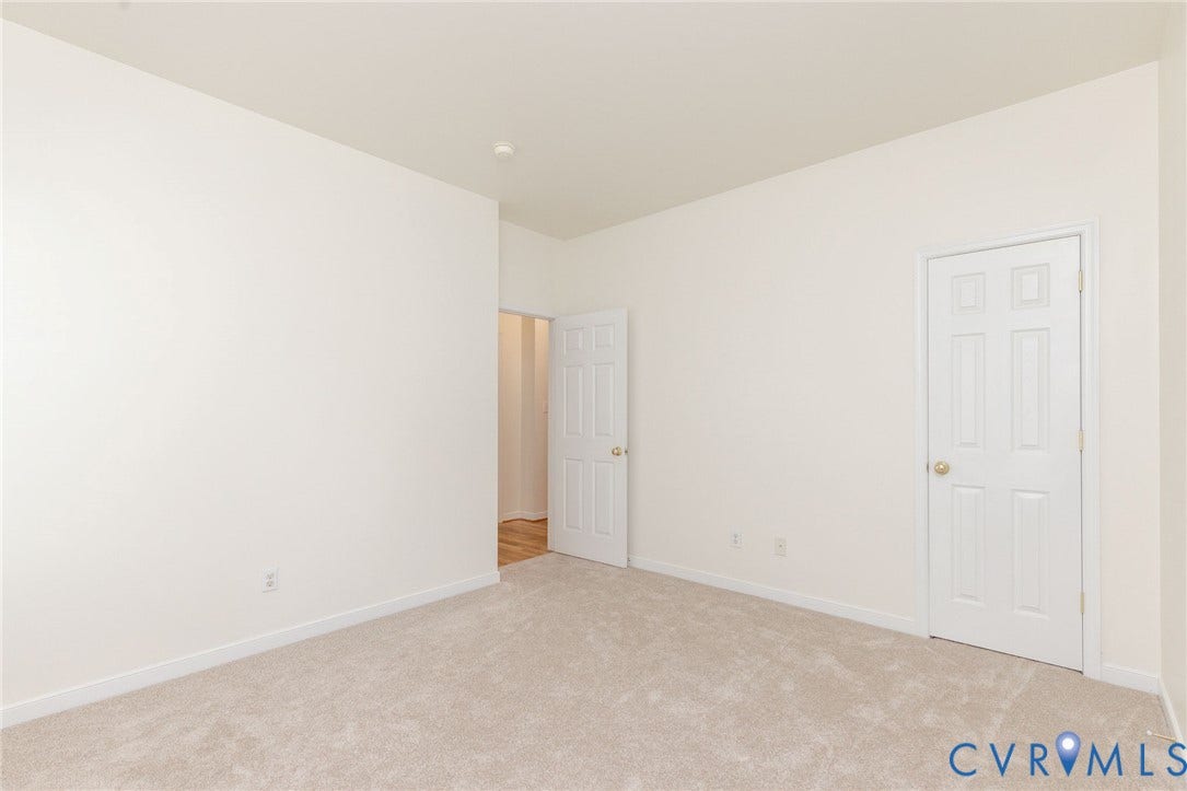 13742 Spyglass Hill Circle, Chesterfield, VA 23832 Neutral-toned wall paint, plush carpeting, and white six-panel doors