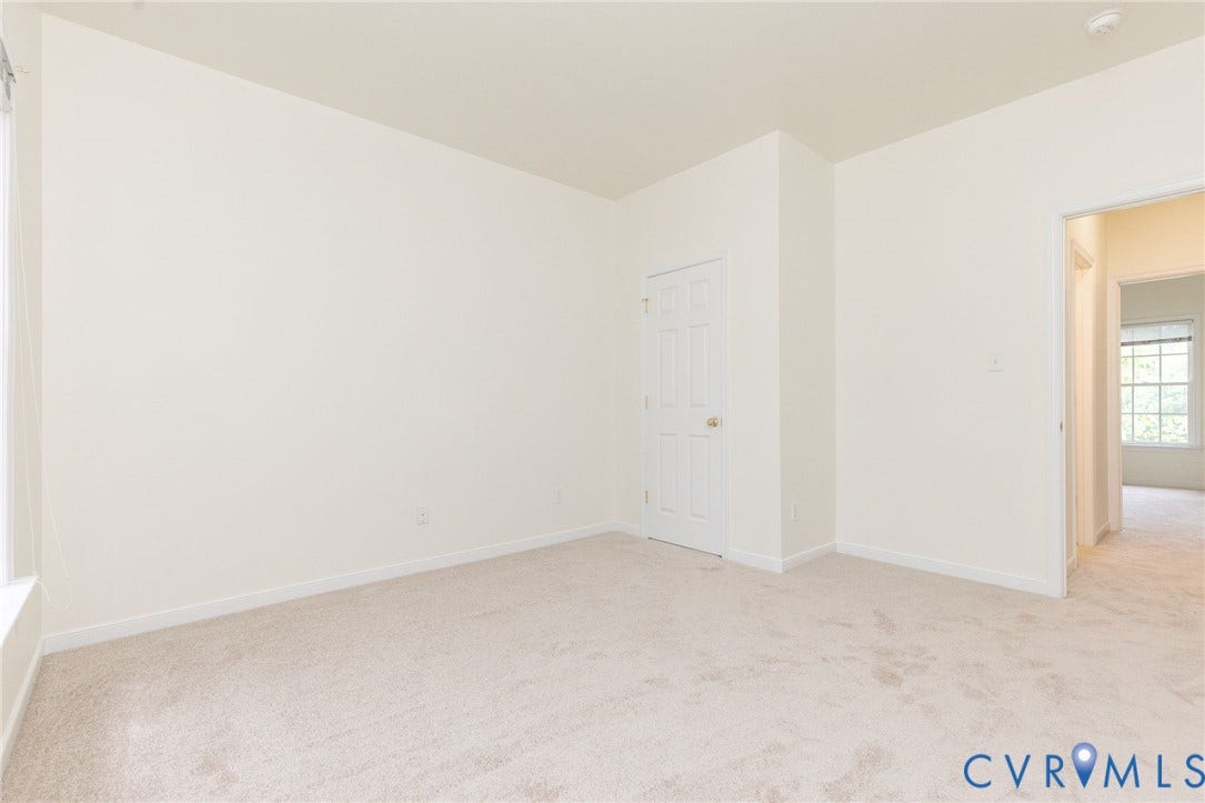 13742 Spyglass Hill Circle, Chesterfield, VA 23832 Neutral interior featuring high-pile wall-to-wall carpeting and a six-panel interior door