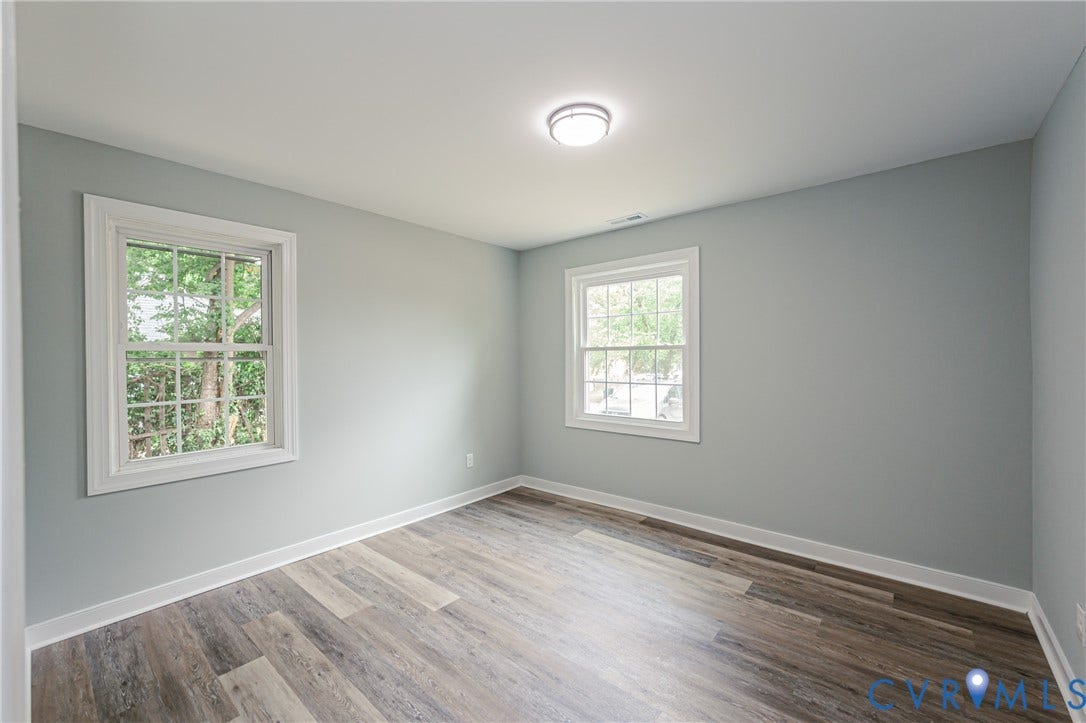 Wood-finish flooring with white trim