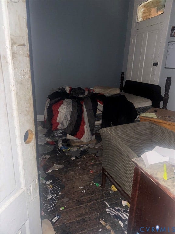 1400 N 29th Street, Richmond, VA 23223 Hardwood flooring, paneled interior door, and a transom window