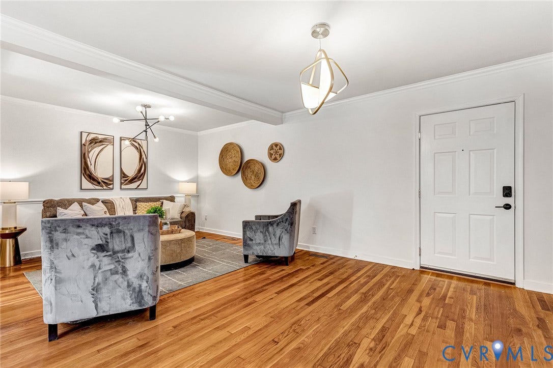 4520 Grove Avenue, #U5, Westhampton, Richmond, VA 23221 Hardwood flooring, crown molding, white paneled door, modern ceiling light fixture, recessed lighting
