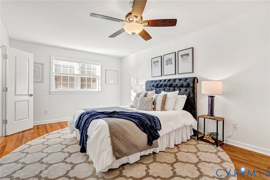 4520 Grove Avenue, #U5, Westhampton, Richmond, VA 23221 Hardwood flooring, white walls, and a ceiling fan with integrated lighting