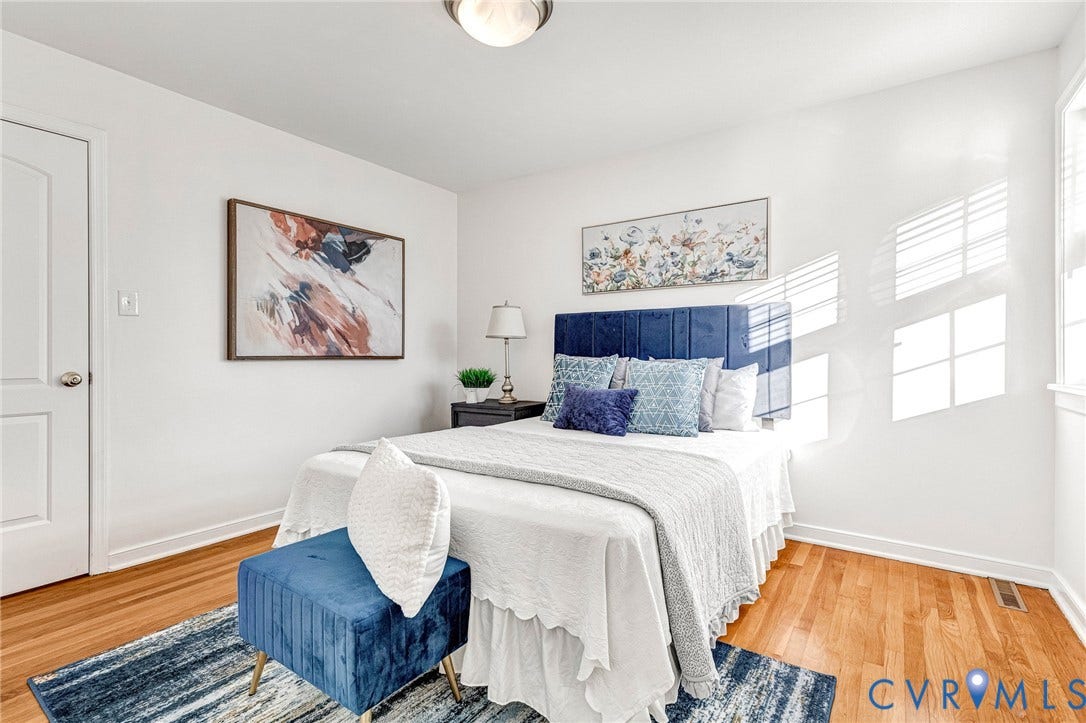 4520 Grove Avenue, #U5, Westhampton, Richmond, VA 23221 White interior paint, wood-finish flooring, white trim, and a ceiling-mounted light fixture