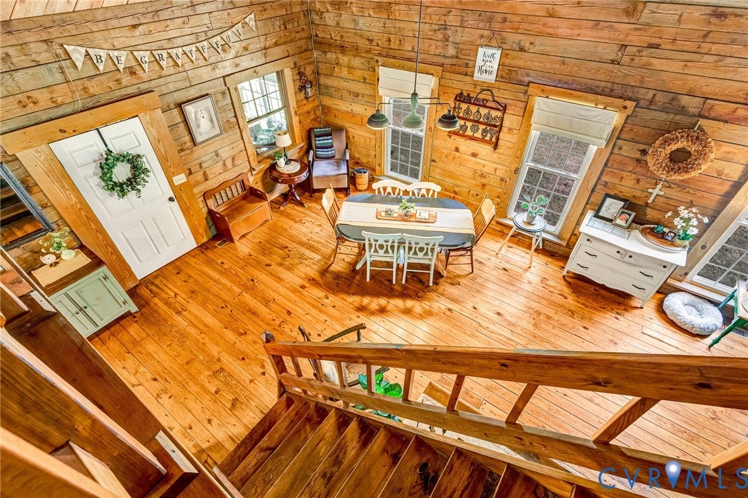 8328 Peaks Road, Hanover, VA 23069 Wood-paneled walls and ceilings complement the wood-finish flooring