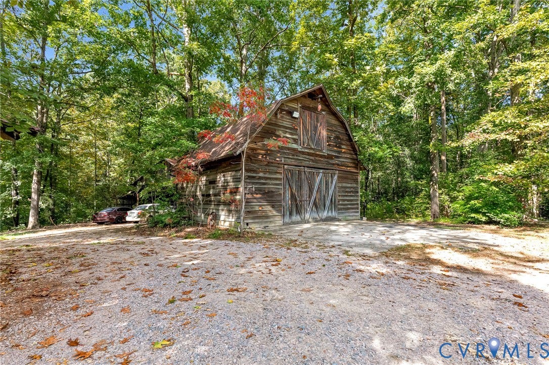 8328 Peaks Road, Hanover, VA 23069 Wood-sided barn with an A-frame roof and dual-panel doors