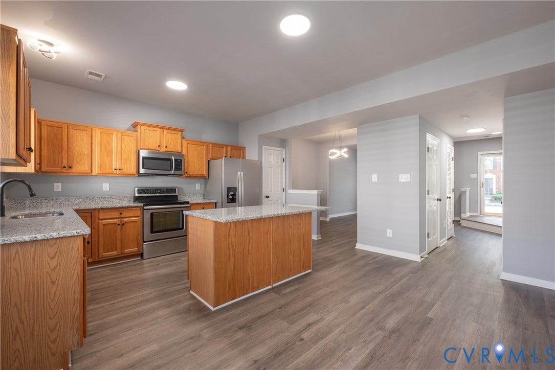 Family Room with a view into the kitchen