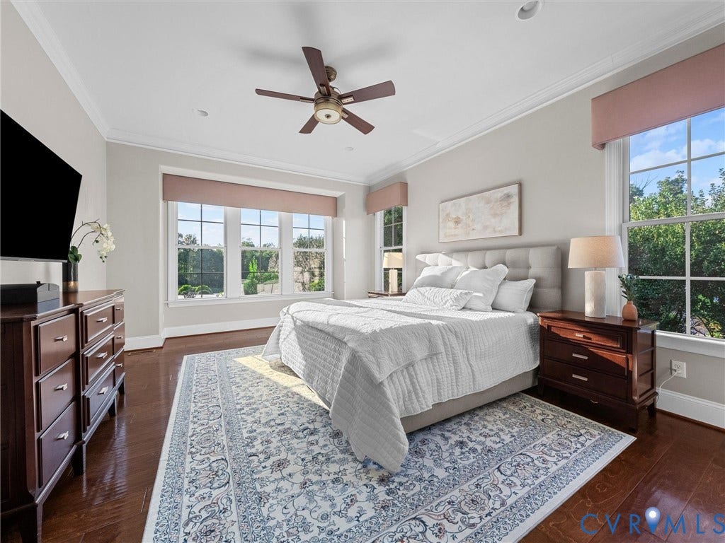 7750 Rock Cress Place, Chesterfield, VA 23120 Spacious room featuring wood-finish flooring, multi-pane windows, crown molding, and a ceiling fan