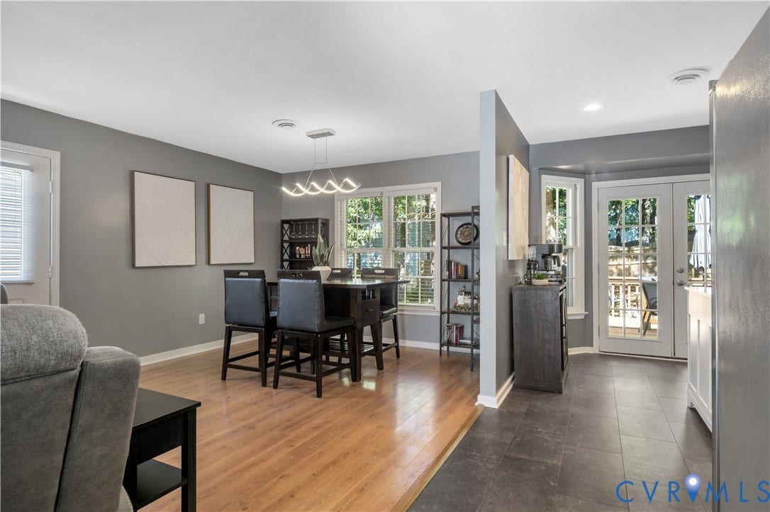 2724 Glen Point Circle, Henrico, VA 23233 Hardwood-style flooring, contemporary chandelier, double French doors, large bay windows, and recessed lighting