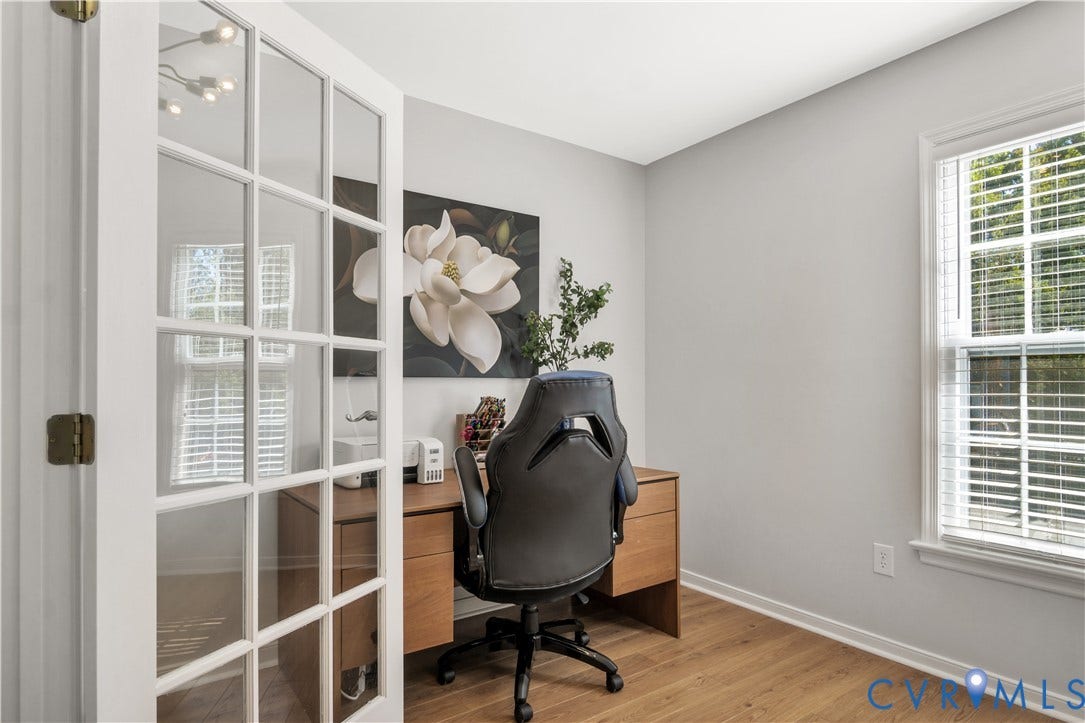2724 Glen Point Circle, Henrico, VA 23233 Room featuring wood-finish flooring, a window with horizontal blinds, and a white framed French door