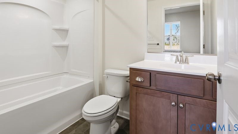 16348 Alexandria Court, Hampton Ridge At Hampton Park, Moseley, VA 23832 First floor guest suite bath. This home is UNDER CONSTRUCTION. The photo represents the plan, not the actual home. Design selections have been made.