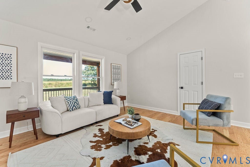 Vaulted ceilings with recessed lighting, wood-finish flooring, and a ceiling fan