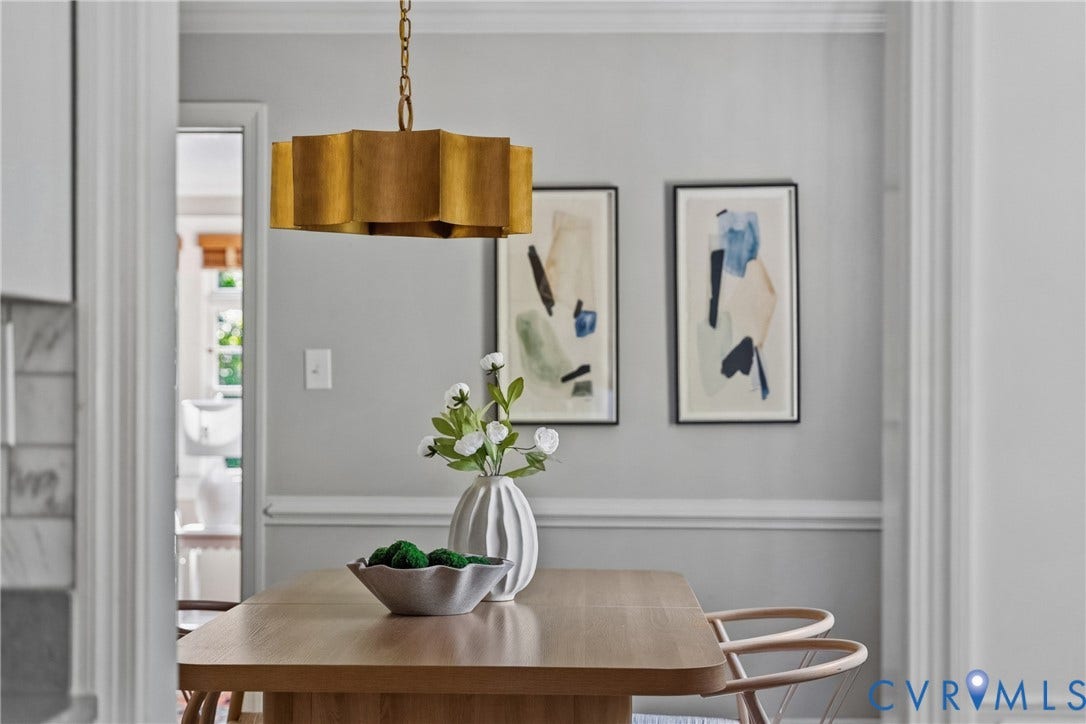 3700 Wakefield Road, Stratofrd Hills, Richmond, VA 23235 Gold-tone metal drum pendant light with a scalloped profile, crisp chair rail molding, and neutral interior wall paint