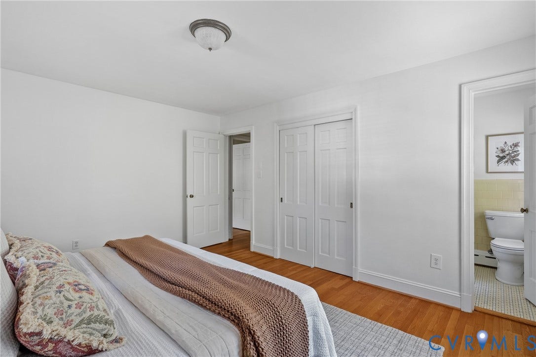 3700 Wakefield Road, Stratofrd Hills, Richmond, VA 23235 Wood-finish flooring, double-panel closet doors, and a ceiling-mounted flush-mount light fixture