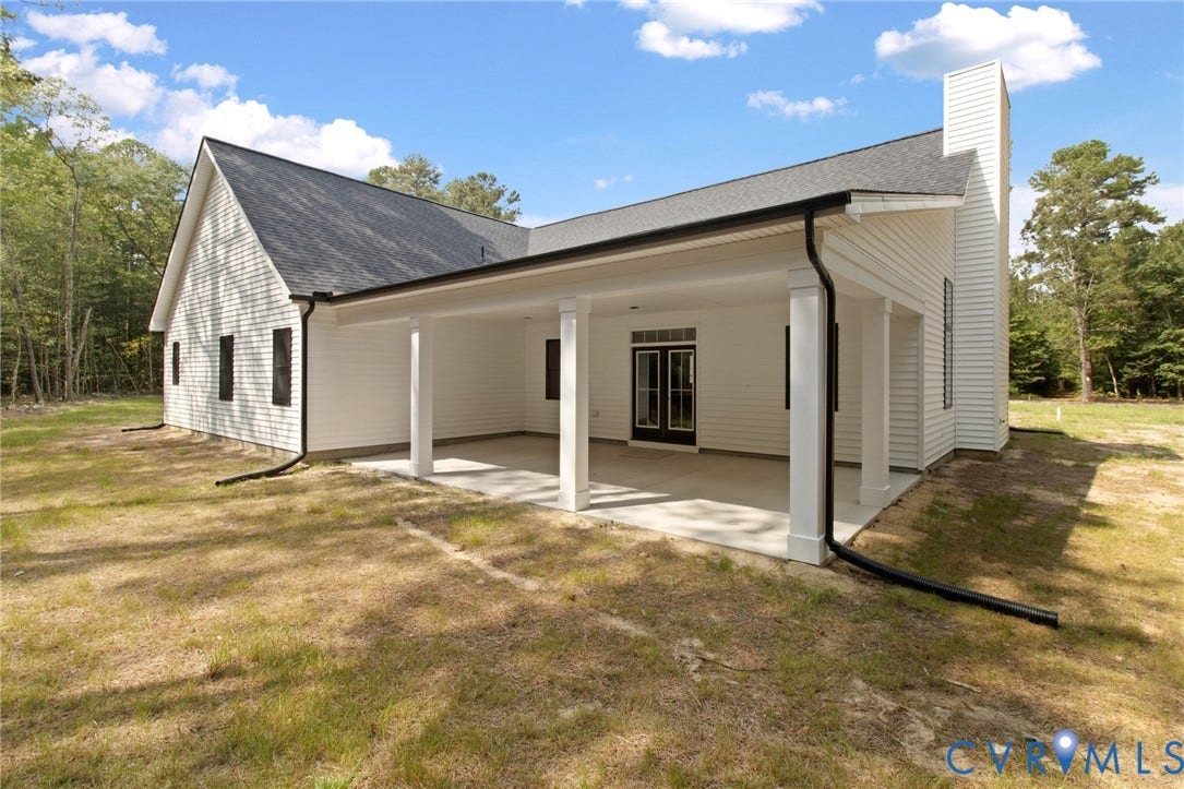 34356 Chinquapin Road, Waverly, VA 23890 Covered concrete patio with multiple support columns and double French doors