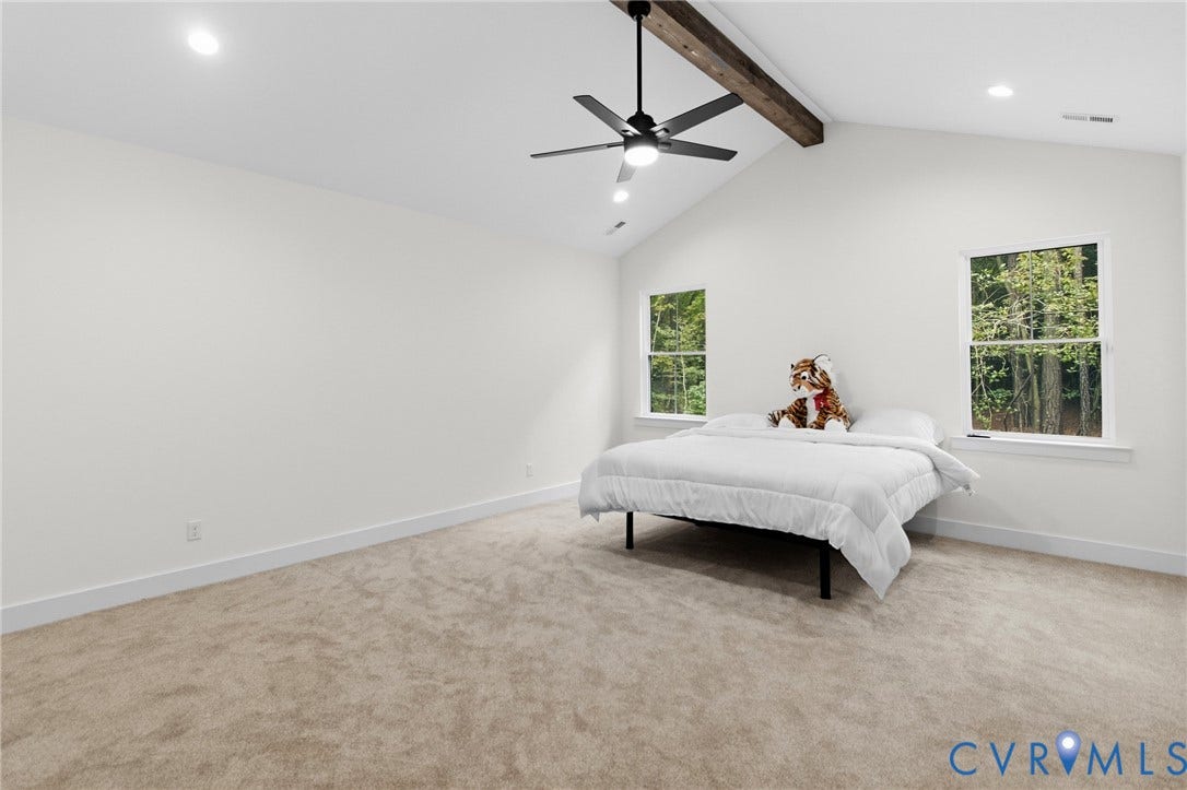 34356 Chinquapin Road, Waverly, VA 23890 Vaulted ceiling with exposed wood beam, recessed lighting, and ceiling fan