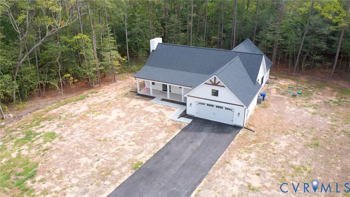 34356 Chinquapin Road, Waverly, VA 23890 White exterior with dark gray roofing