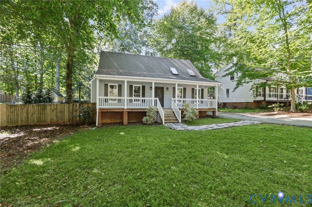 13811 Buck Rub Drive, Chesterfield, VA 23112 Light blue siding exterior with a covered front porch featuring white railings