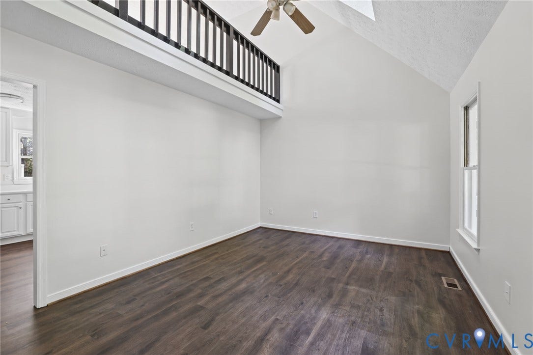 13811 Buck Rub Drive, Chesterfield, VA 23112 Vaulted ceiling, wood-finish flooring, white walls, and an overhead ceiling fan