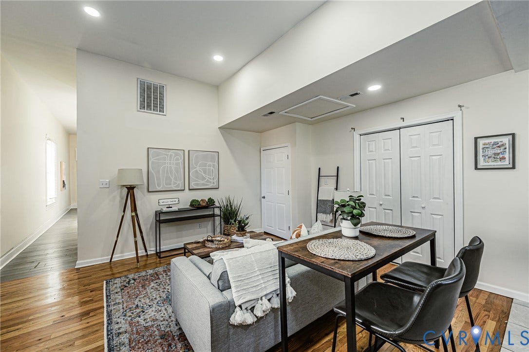 2011 Chicago Avenue, Richmond, VA 23224 Open-concept interior featuring wood-finish flooring, recessed lighting, and double-door closet cabinetry