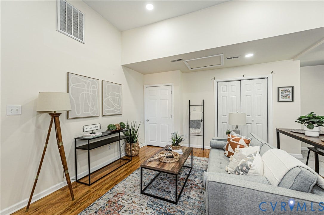 2011 Chicago Avenue, Richmond, VA 23224 Vaulted ceiling featuring recessed lighting, wood-finish flooring, and double-door closet storage