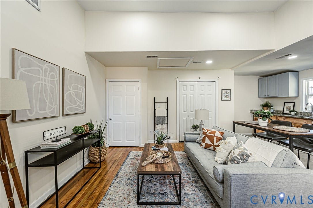 2011 Chicago Avenue, Richmond, VA 23224 High-vaulted ceilings featuring recessed lighting, paired with wood-finish flooring and paneled interior doors