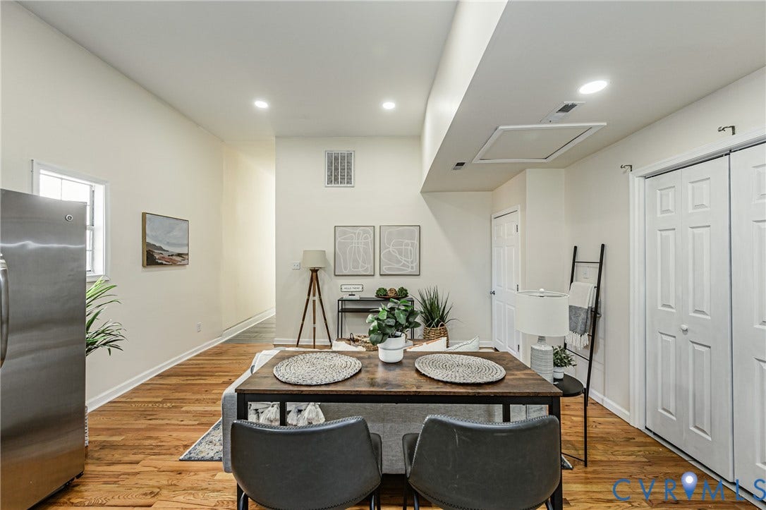 2011 Chicago Avenue, Richmond, VA 23224 Interior space featuring vaulted ceilings, recessed lighting, and wood-finish flooring, complemented by six-panel interior doors and a dual-panel closet