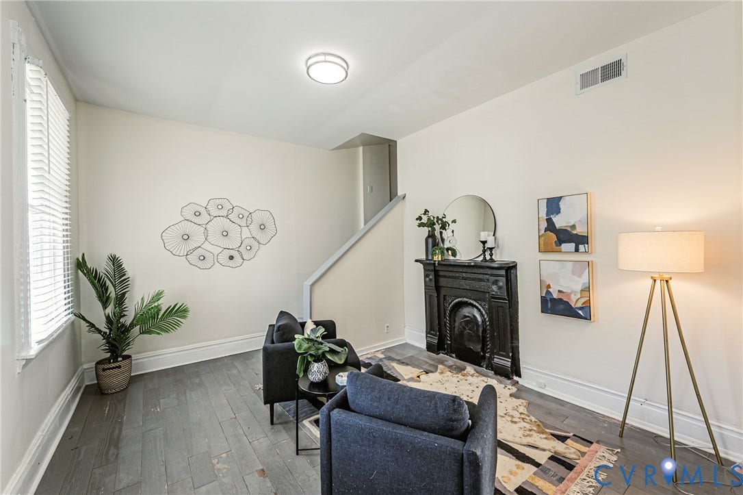 2011 Chicago Avenue, Richmond, VA 23224 Interior space featuring wood-finish flooring, a decorative metal fireplace mantel, and recessed ceiling lighting