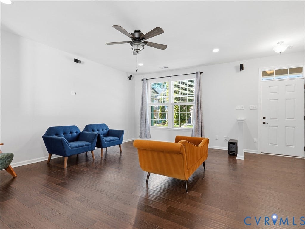 5612 Riverside Heights Way, Richmond, VA 23225 Welcoming living room with ample natural light and hardwood floors
