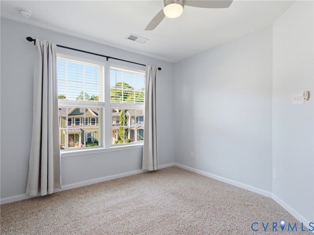 5612 Riverside Heights Way, Richmond, VA 23225 Bright secondary bedroom with a comfortable layout for family or guests