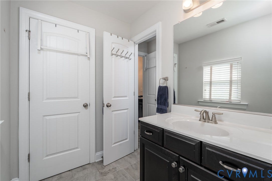 15412 Greenley Place, Hartridge At Harper's Mill, Chesterfield, VA 23832 Separate private vanity areas offer added convenience within the shared bathroom arrangement.