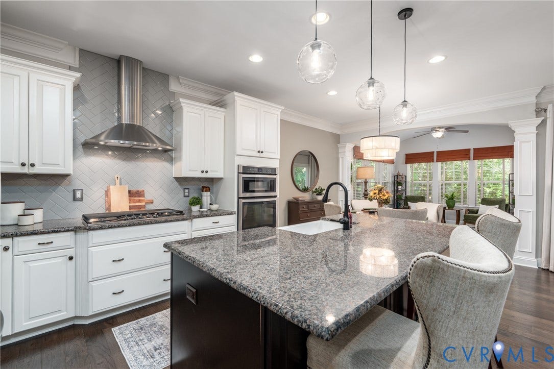 15412 Greenley Place, Hartridge At Harper's Mill, Chesterfield, VA 23832 Gourmet kitchen features an expansive island and gas cooking.