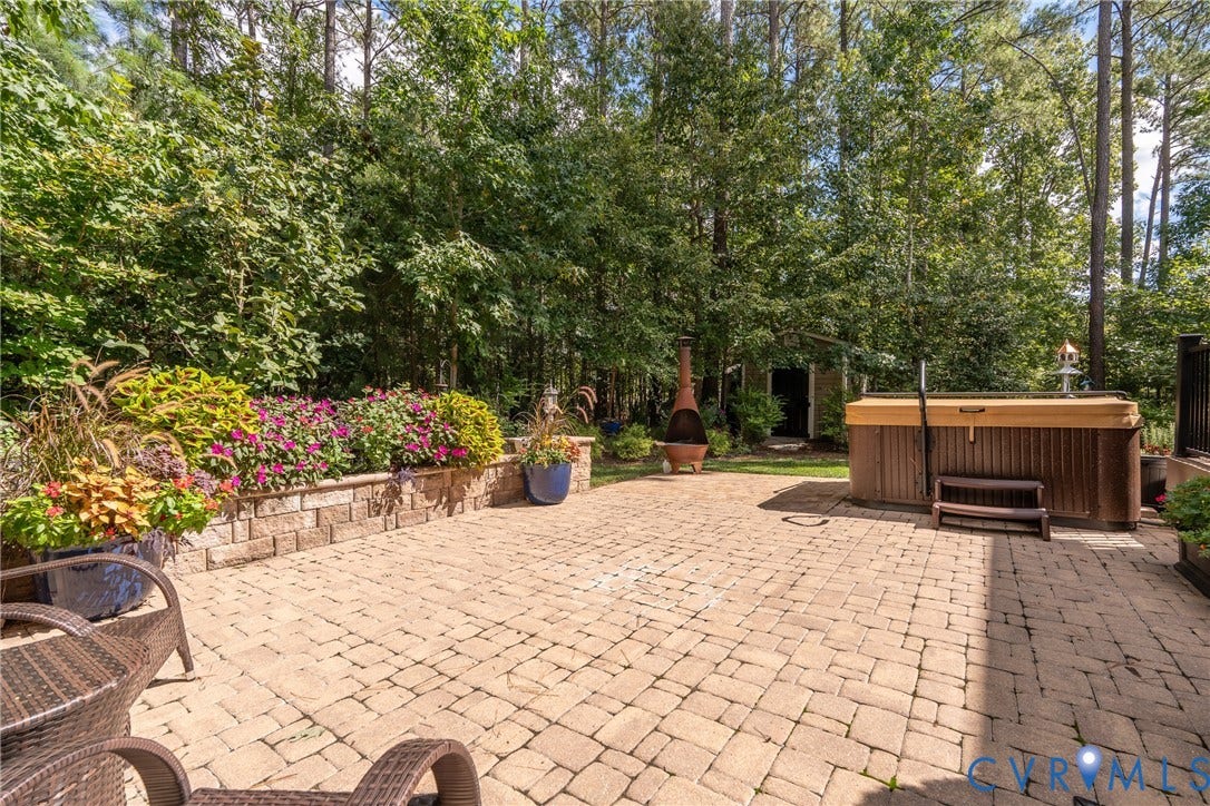 15412 Greenley Place, Hartridge At Harper's Mill, Chesterfield, VA 23832 A custom paver patio provides a beautiful setting for the hot tub and surrounding lounge areas.