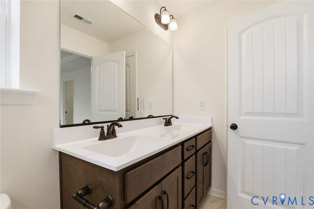 16336 Alexandria Court, Hampton Ridge At Hampton Park, Moseley, VA 23832 Primary Bath 2. This home is UNDER CONSTRUCTION. The photo represents the plan, not the actual home. Design selections have been made.