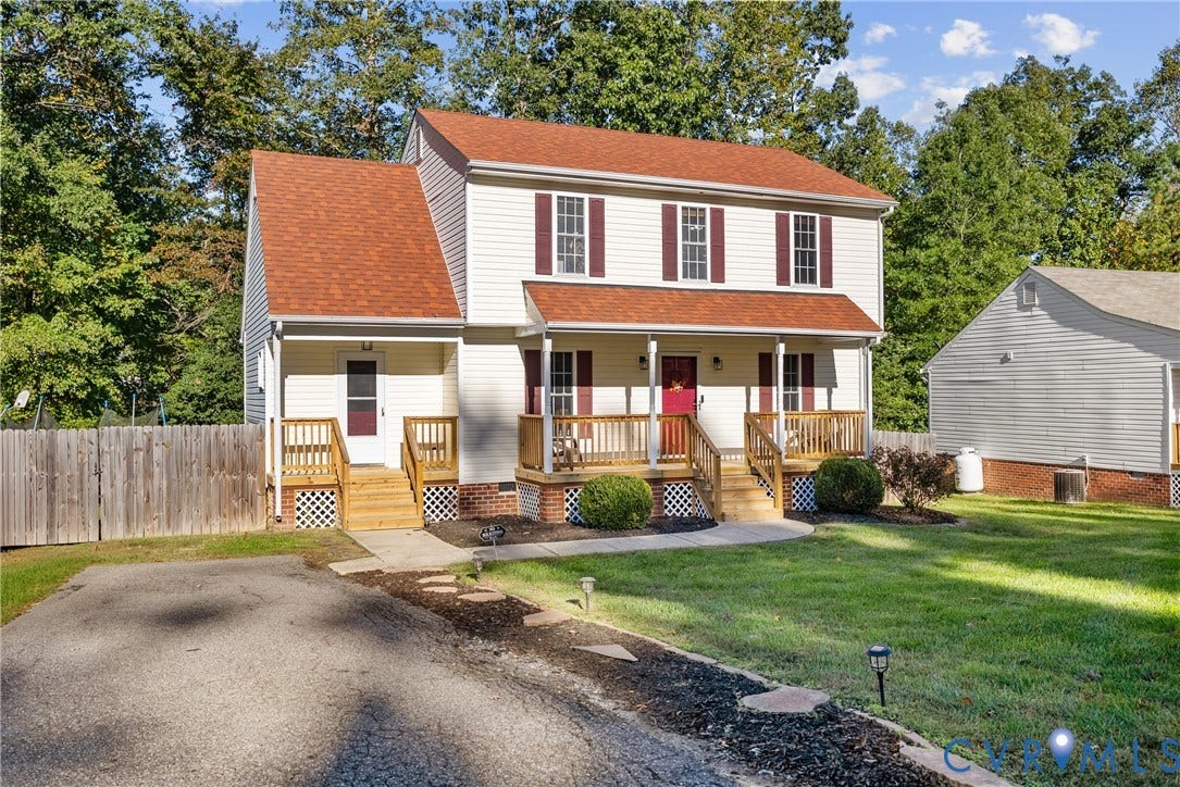 11512 Wiltstaff Drive, Midlothian, VA 23112 Two-story home with light siding, a shingled roof, a covered front porch featuring wooden railing, and a paved driveway