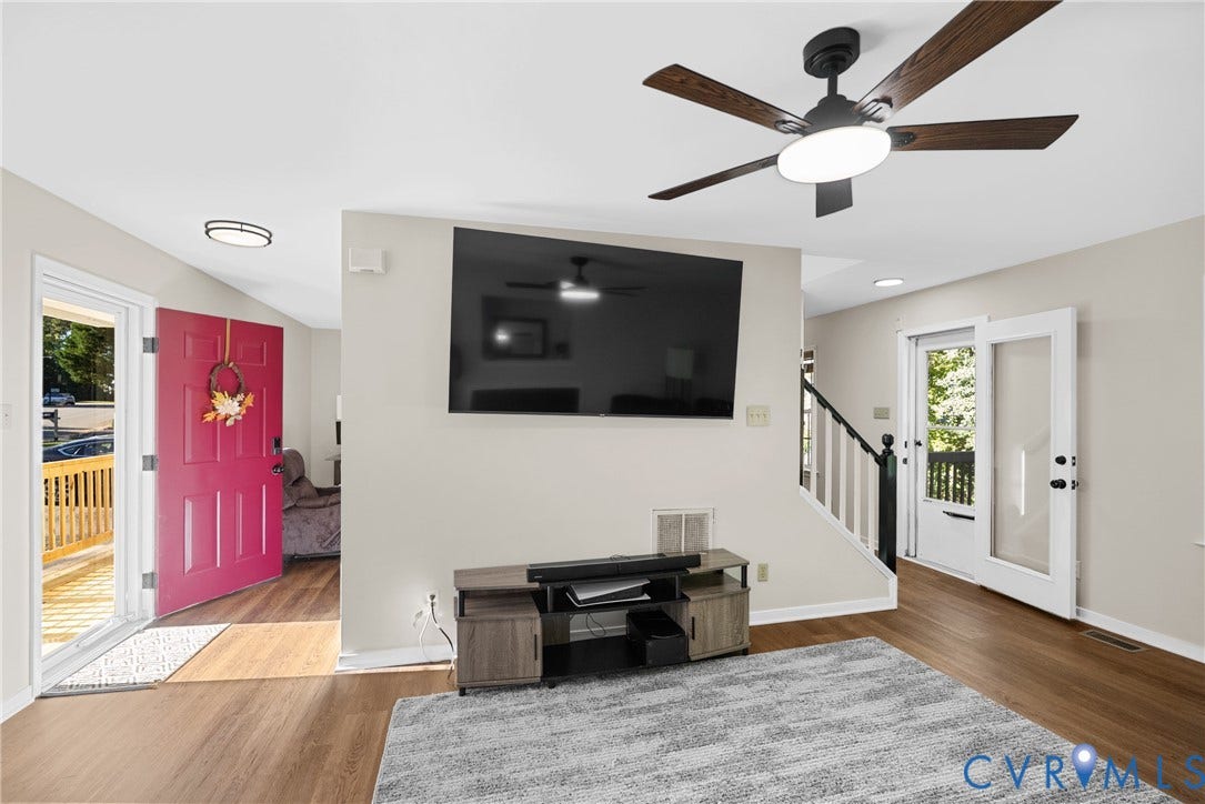 11512 Wiltstaff Drive, Midlothian, VA 23112 Wood-finish flooring, ceiling fan with integrated lighting, recessed lighting, and a partial staircase with a black handrail