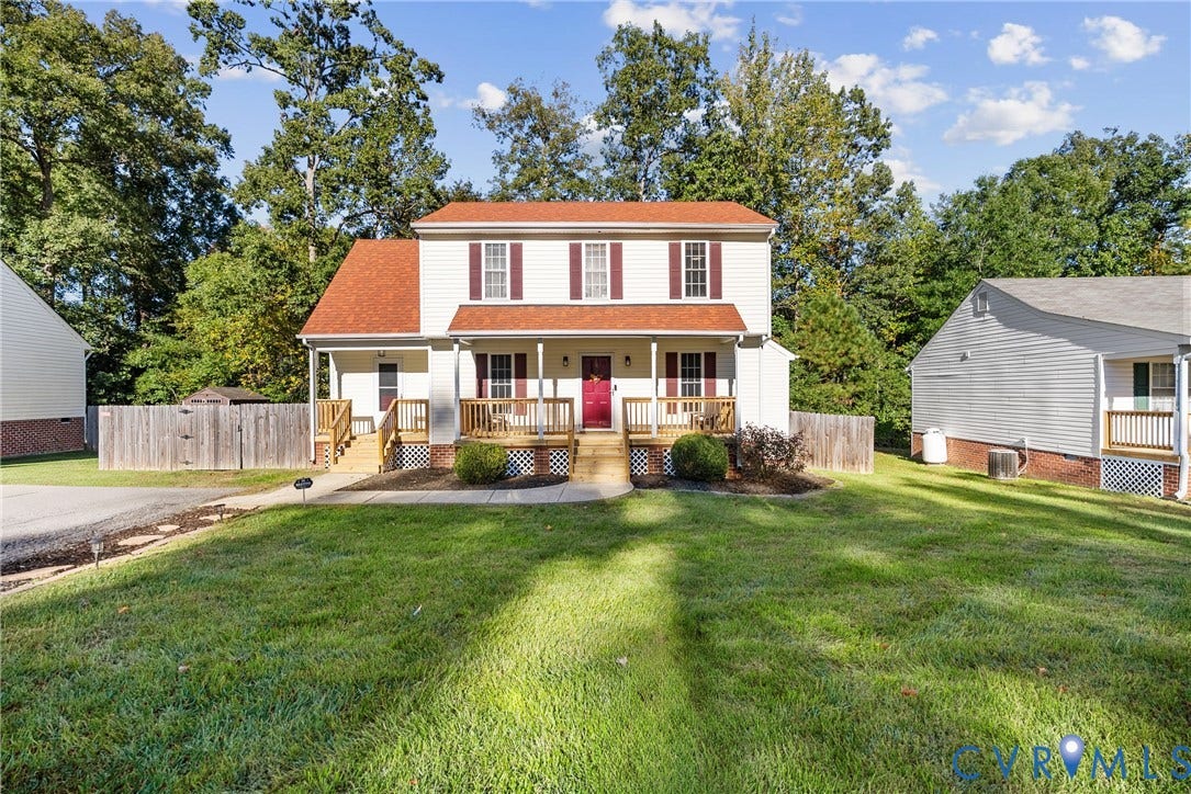 11512 Wiltstaff Drive, Midlothian, VA 23112 Two-story residence featuring a covered front porch, red-toned shingle roof, neutral siding, and shutter-framed windows