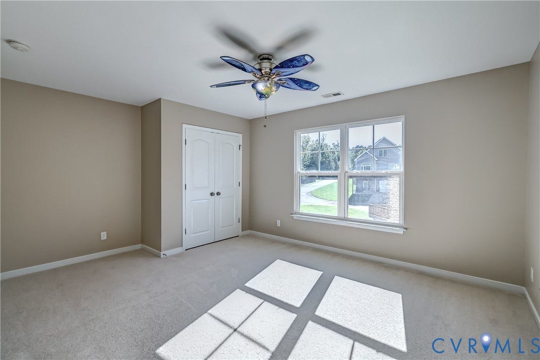 14800 Diamond Creek Terrace, Midlothian, VA 23113 Bedroom 3 is spacious and bright as well bragging a double door closet! (Love the groovy ceiling fan. We can replace if it doesn't suit)