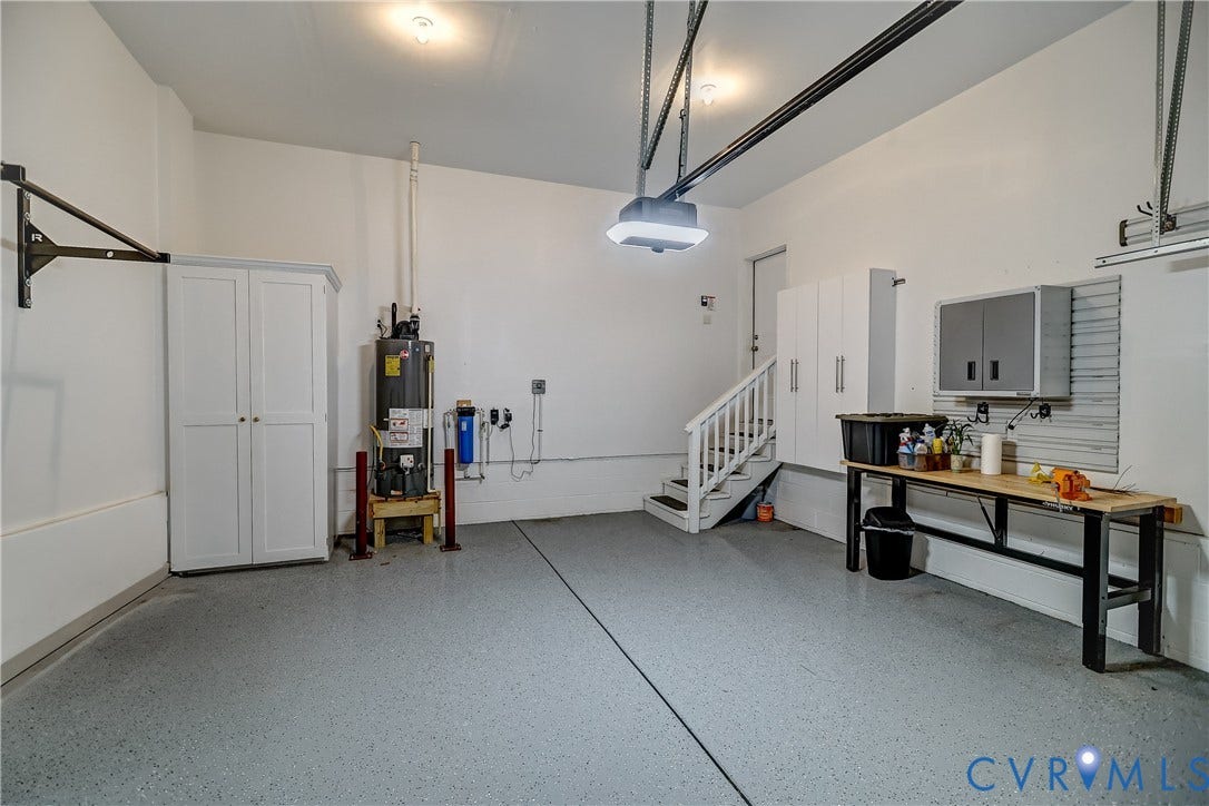 14800 Diamond Creek Terrace, Midlothian, VA 23113 I rarely find garages worth making a big deal over-- BUT WOWIE KAZOWIE!!!! Note the built in storage, the additional cabinets, the workbench, the floor which could serve at a National Institute of Health lab!