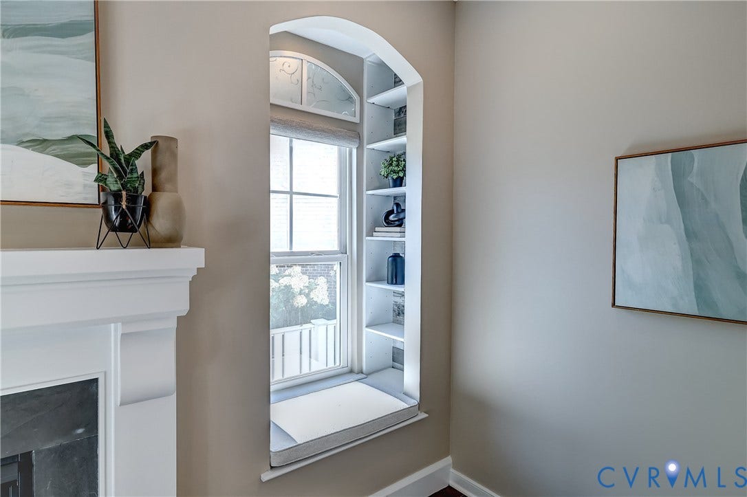 14800 Diamond Creek Terrace, Midlothian, VA 23113 Arched window alcove with built-in shelving, window seat, and intricate upper window detail