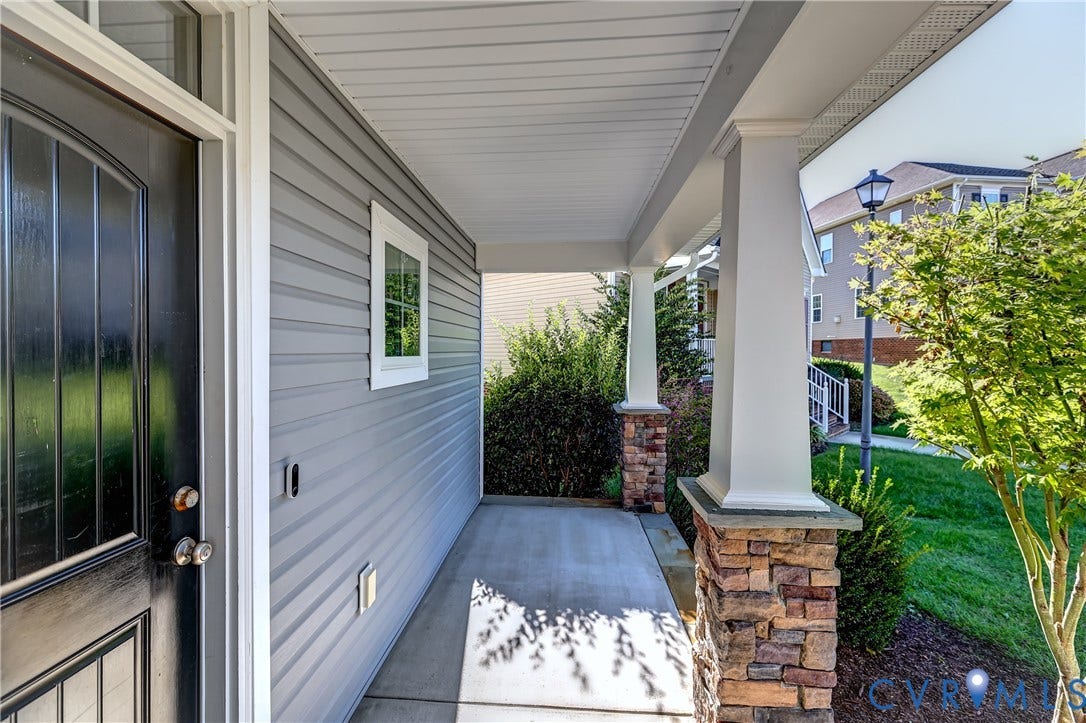 14800 Diamond Creek Terrace, Midlothian, VA 23113 The Craftsman columns and stone clad pillars of the front porch create such a charming aesthetic