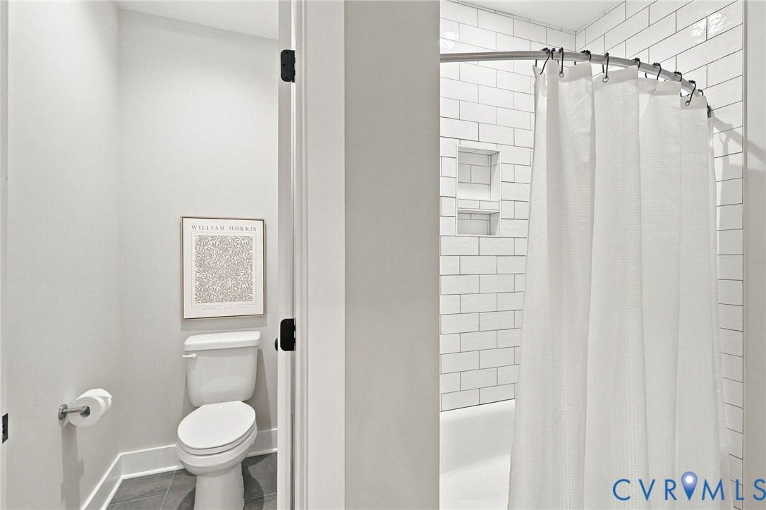 14010 Summercliff Trail, Chesterfield, VA 23832 Something You Never See in a Hall Bathroom - a Water Closet. The Tub/Shower has a Ceramic Surround.