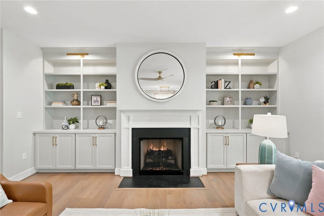14010 Summercliff Trail, Chesterfield, VA 23832 The Custom Bookcases Include Picture Lights & the Gas Fireplace Perfect for Chilly Nights