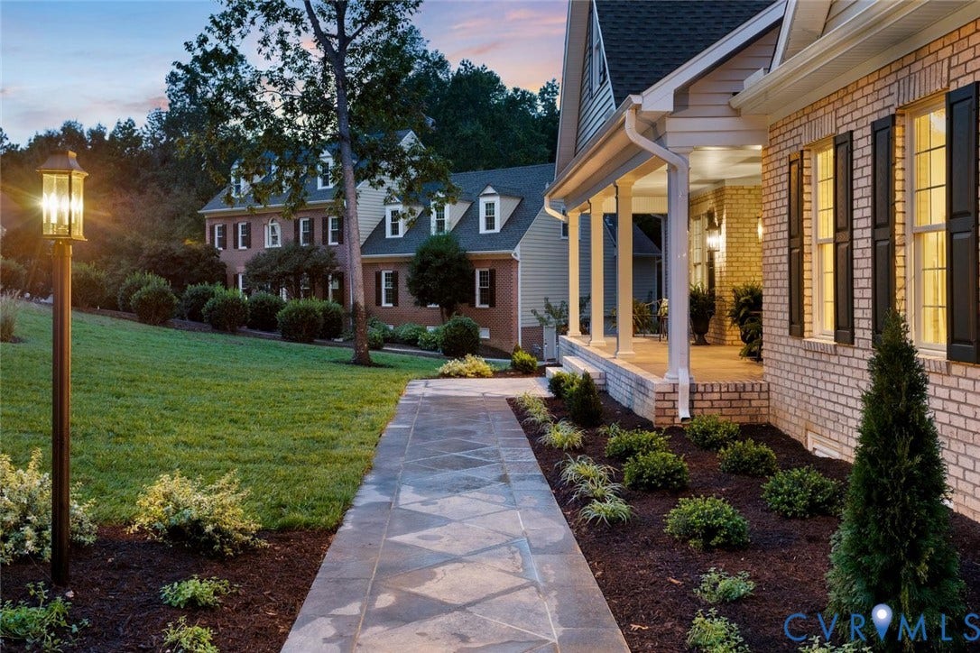 14010 Summercliff Trail, Chesterfield, VA 23832 Brick exterior with decorative shutters, covered porch with column supports, stone-finish walkway, and extensive landscaping