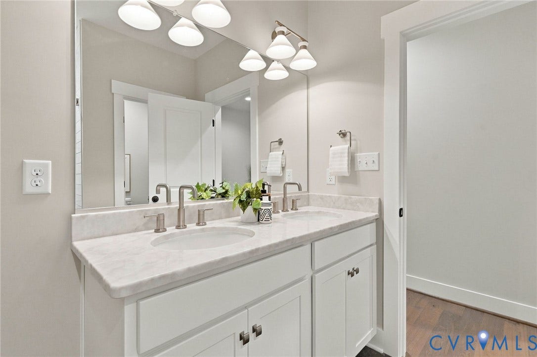 14010 Summercliff Trail, Chesterfield, VA 23832 Upgraded Lighting and Brushed Nickel Accents Complete the Hall Bath