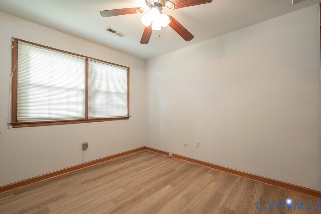 Wood-finish flooring with coordinating wood trim