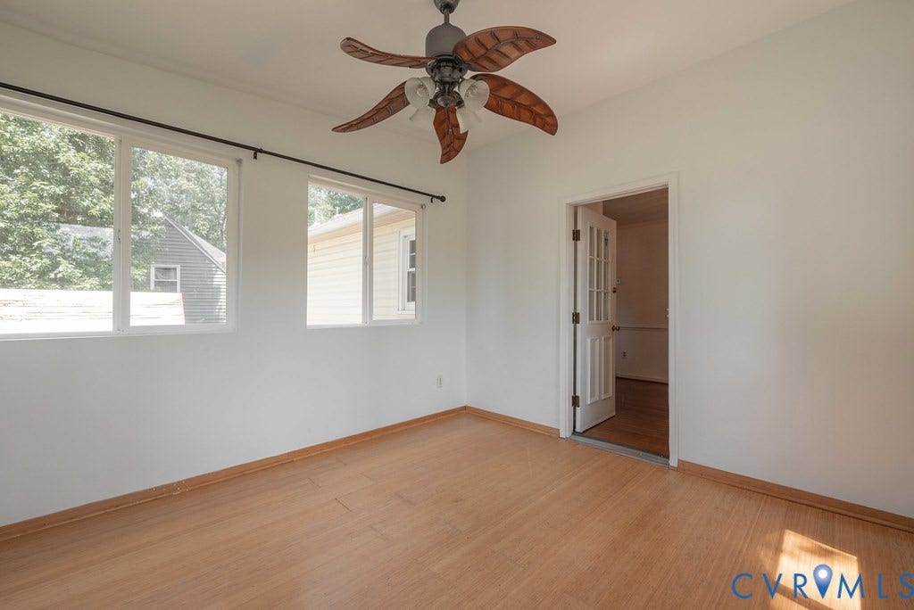 Wood-finish flooring with white walls
