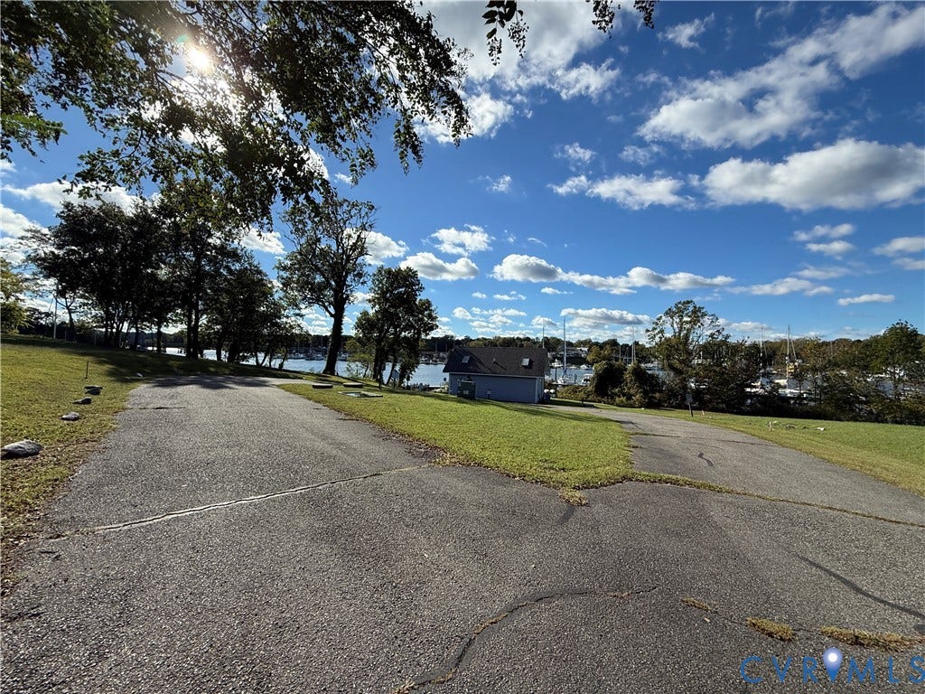 #30 Molly's Way, Urbanna, VA 23175 Paved drive with green space and water frontage